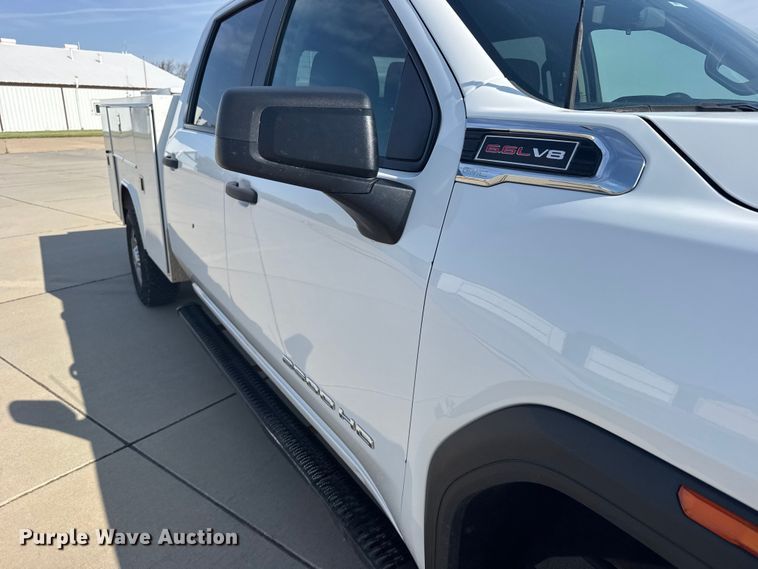 image for item FB7403 2023 GMC Sierra 2500HD Crew Cab utility bed pickup truck
