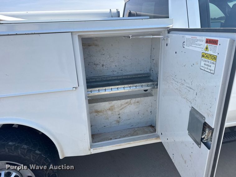 image for item FB7403 2023 GMC Sierra 2500HD Crew Cab utility bed pickup truck