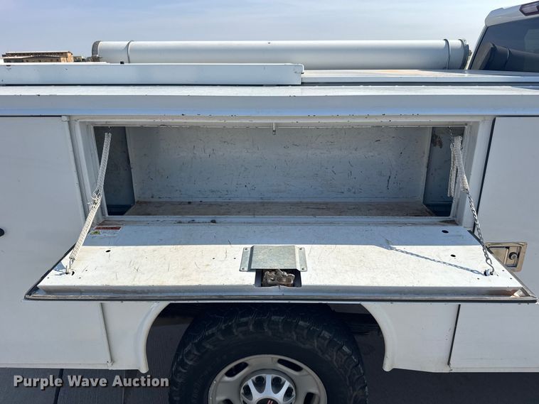 image for item FB7403 2023 GMC Sierra 2500HD Crew Cab utility bed pickup truck