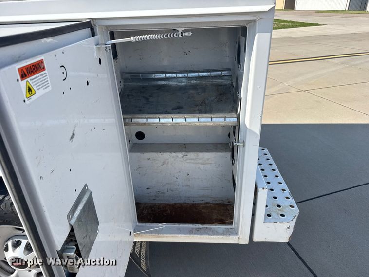 image for item FB7403 2023 GMC Sierra 2500HD Crew Cab utility bed pickup truck