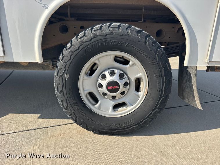 image for item FB7403 2023 GMC Sierra 2500HD Crew Cab utility bed pickup truck