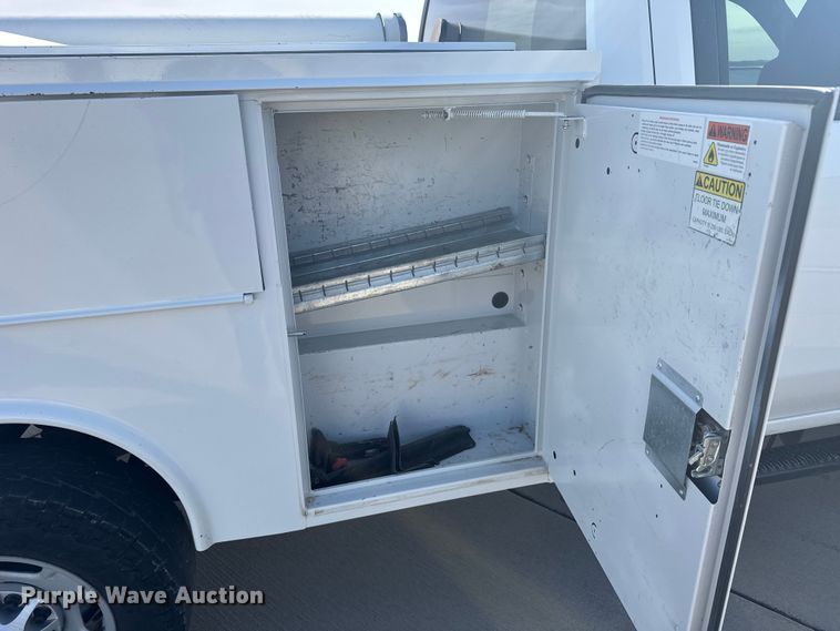 image for item FB7404 2023 Chevrolet Silverado 2500HD Crew Cab utility bed pickup truck