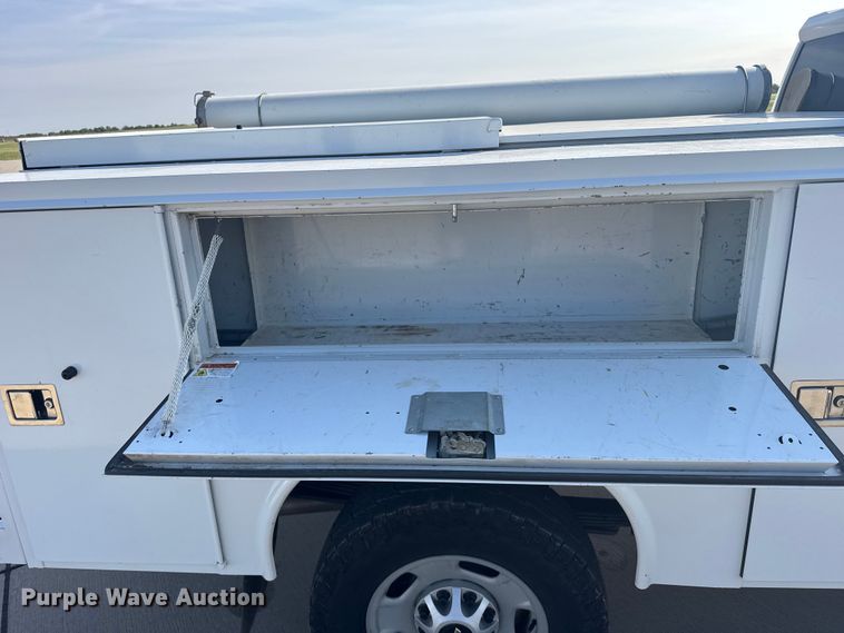image for item FB7404 2023 Chevrolet Silverado 2500HD Crew Cab utility bed pickup truck