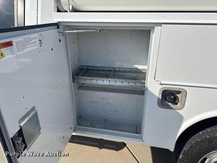 image for item FB7404 2023 Chevrolet Silverado 2500HD Crew Cab utility bed pickup truck
