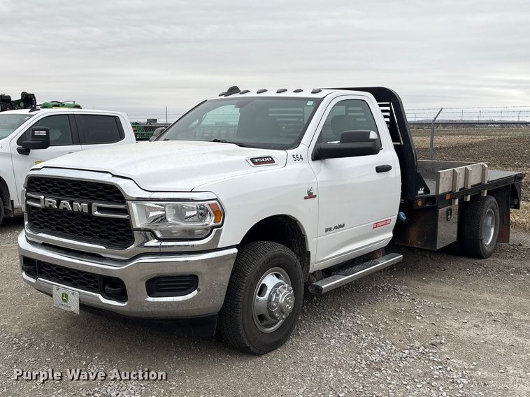 image for item FG2576 2022 RAM 3500 flatbed pickup truck