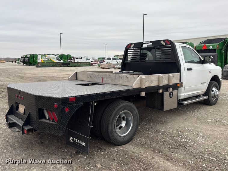 image for item FG2576 2022 RAM 3500 flatbed pickup truck