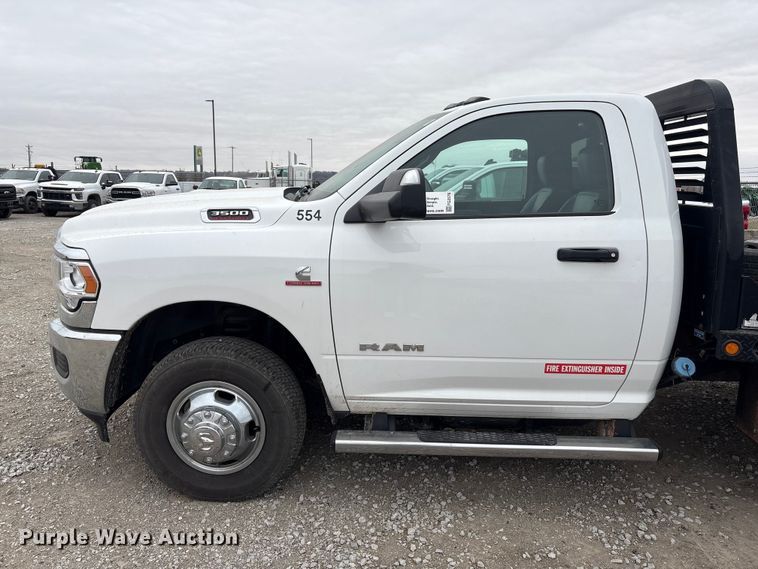 image for item FG2576 2022 RAM 3500 flatbed pickup truck