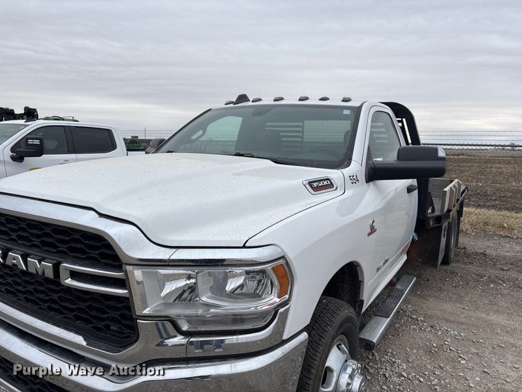 image for item FG2576 2022 RAM 3500 flatbed pickup truck