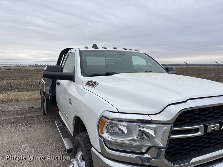 image for item FG2576 2022 RAM 3500 flatbed pickup truck