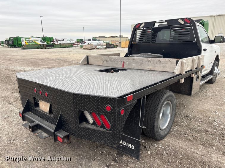 image for item FG2576 2022 RAM 3500 flatbed pickup truck