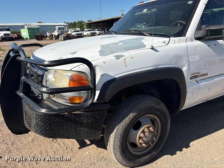 image for item FI0170 2007 GMC 3500 Crew Cab utility bed pickup truck