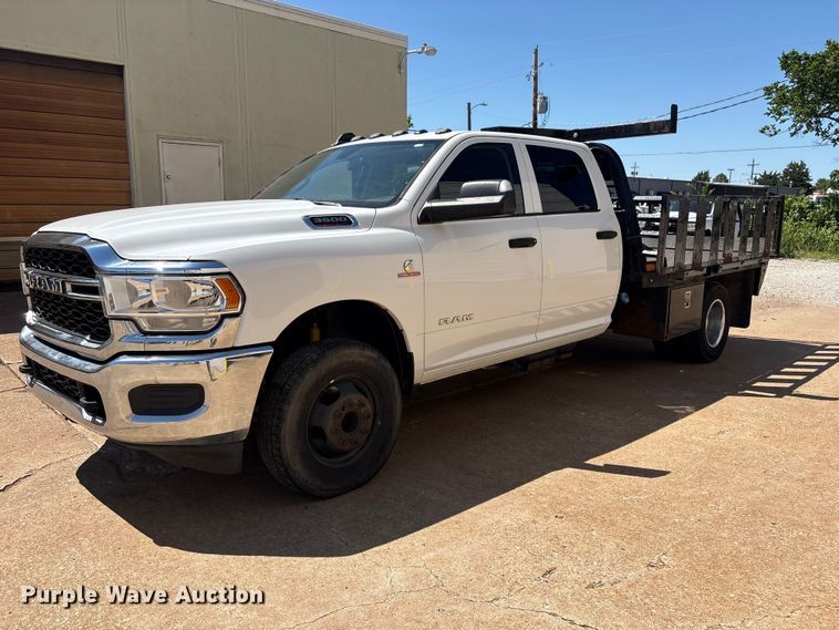 image for item FI0179 2019 RAM 3500 Crew Cab flatbed pickup truck