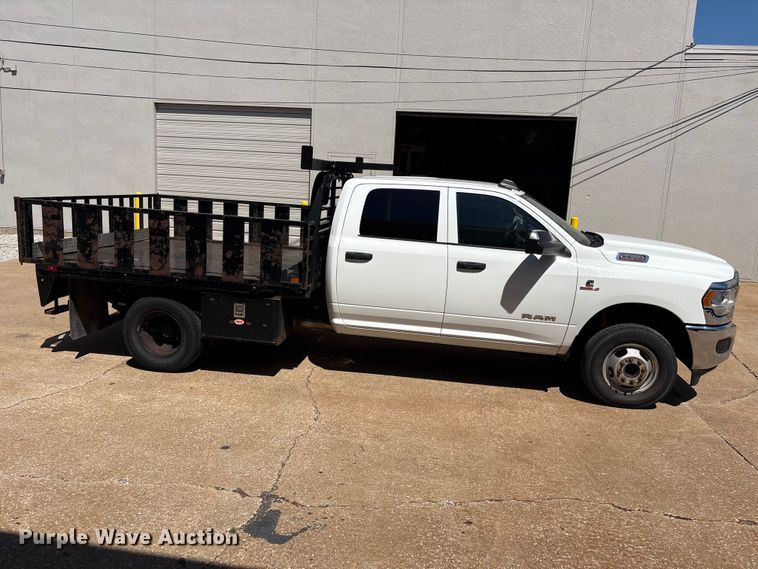 image for item FI0179 2019 RAM 3500 Crew Cab flatbed pickup truck