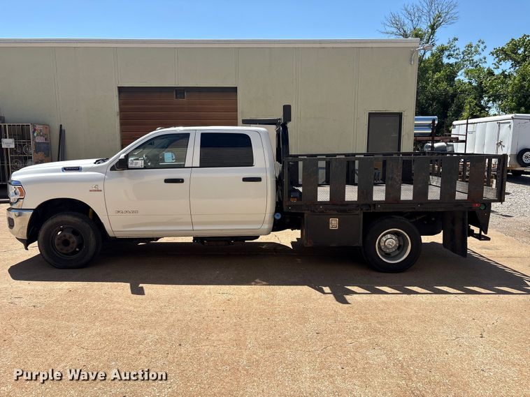 image for item FI0179 2019 RAM 3500 Crew Cab flatbed pickup truck