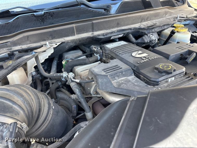 image for item FI0179 2019 RAM 3500 Crew Cab flatbed pickup truck