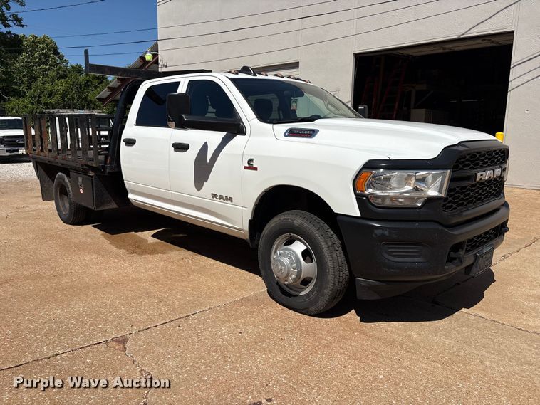 image for item FI0180 2020 RAM 3500 Crew Cab flatbed pickup truck
