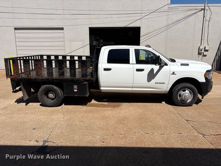 image for item FI0180 2020 RAM 3500 Crew Cab flatbed pickup truck