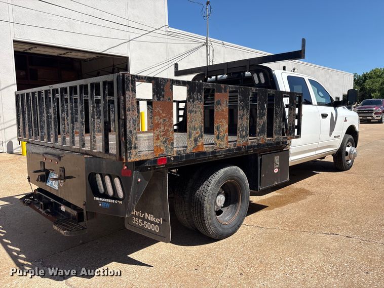 image for item FI0180 2020 RAM 3500 Crew Cab flatbed pickup truck