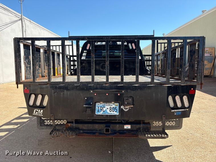 image for item FI0180 2020 RAM 3500 Crew Cab flatbed pickup truck