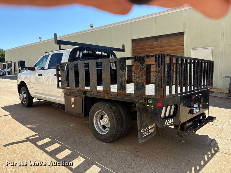 image for item FI0180 2020 RAM 3500 Crew Cab flatbed pickup truck