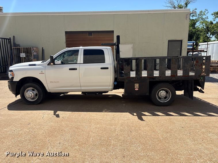 image for item FI0180 2020 RAM 3500 Crew Cab flatbed pickup truck
