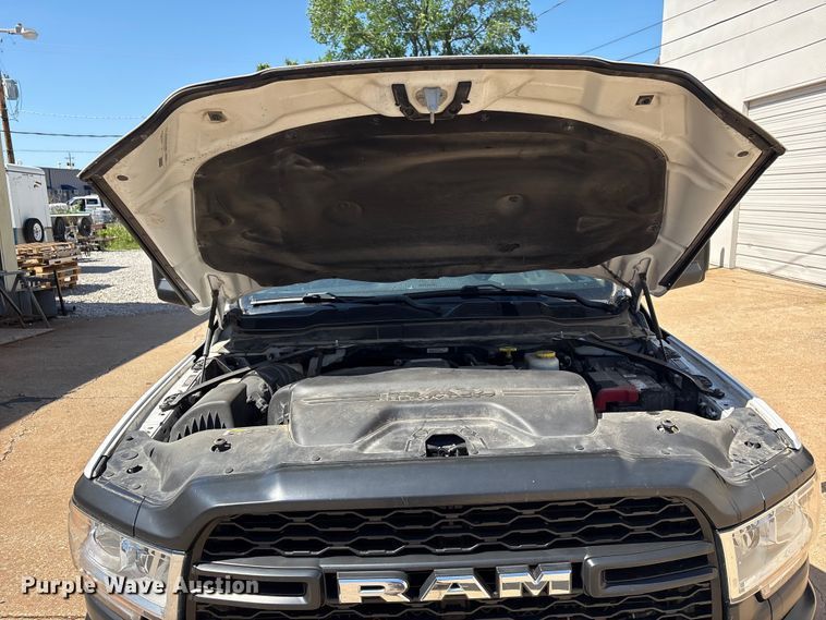 image for item FI0180 2020 RAM 3500 Crew Cab flatbed pickup truck