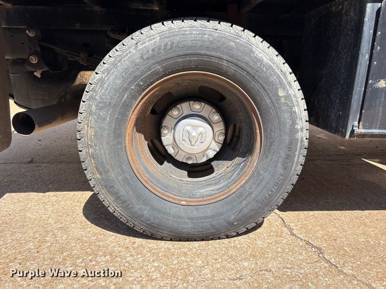image for item FI0180 2020 RAM 3500 Crew Cab flatbed pickup truck