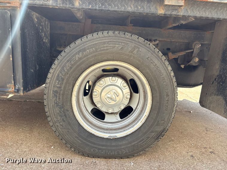 image for item FI0180 2020 RAM 3500 Crew Cab flatbed pickup truck
