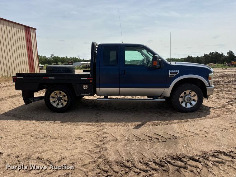 image for item NA9324 2010 Ford F250 Lariat Super Duty Ext. Cab flatbed pickup truck