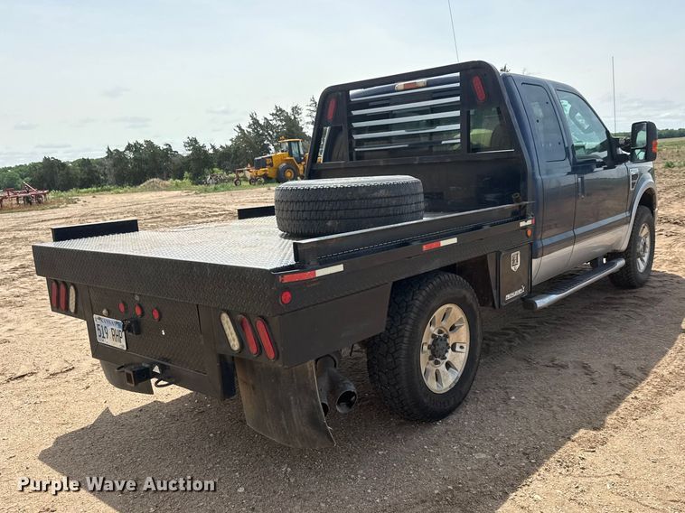 image for item NA9324 2010 Ford F250 Lariat Super Duty Ext. Cab flatbed pickup truck