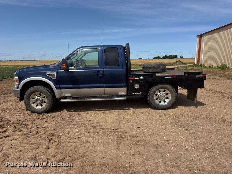 image for item NA9324 2010 Ford F250 Lariat Super Duty Ext. Cab flatbed pickup truck