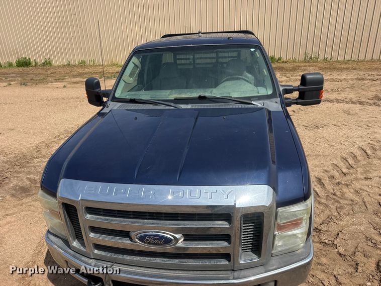 image for item NA9324 2010 Ford F250 Lariat Super Duty Ext. Cab flatbed pickup truck
