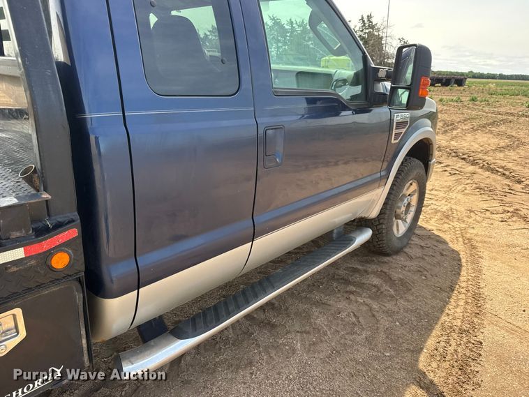 image for item NA9324 2010 Ford F250 Lariat Super Duty Ext. Cab flatbed pickup truck