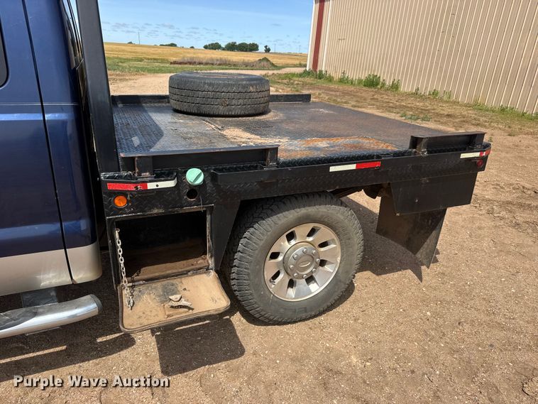 image for item NA9324 2010 Ford F250 Lariat Super Duty Ext. Cab flatbed pickup truck