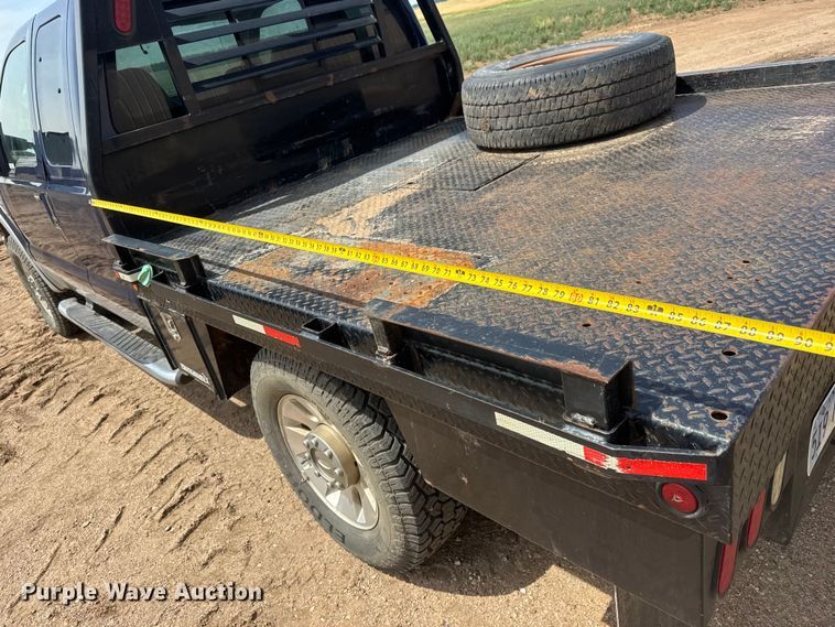 image for item NA9324 2010 Ford F250 Lariat Super Duty Ext. Cab flatbed pickup truck