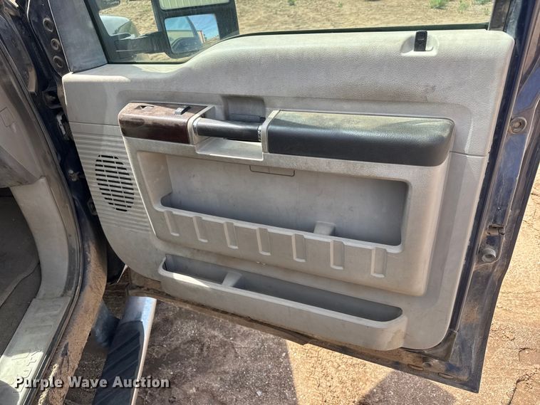 image for item NA9324 2010 Ford F250 Lariat Super Duty Ext. Cab flatbed pickup truck