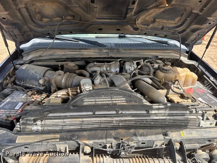 image for item NA9324 2010 Ford F250 Lariat Super Duty Ext. Cab flatbed pickup truck