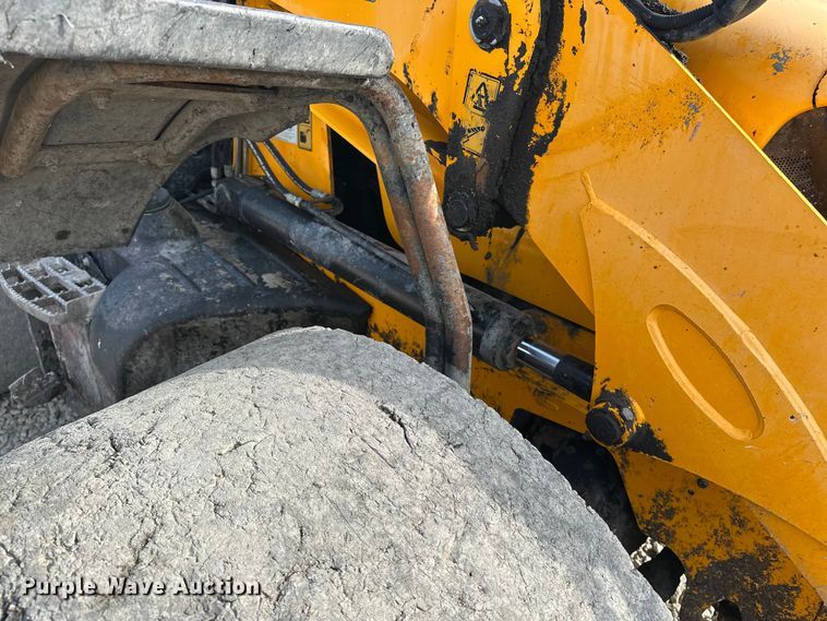 image for item EA4875 2010 JCB 4CX15-T backhoe