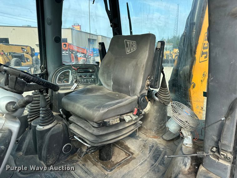 image for item EA4875 2010 JCB 4CX15-T backhoe