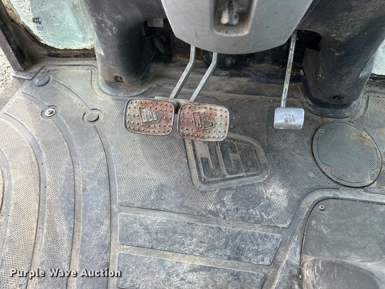 image for item EA4875 2010 JCB 4CX15-T backhoe
