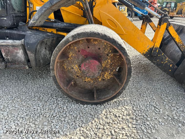 image for item EA4875 2010 JCB 4CX15-T backhoe