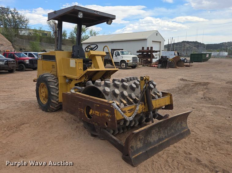 image for item EB1458 1997 Caterpillar CP-433C single drum vibratory roller