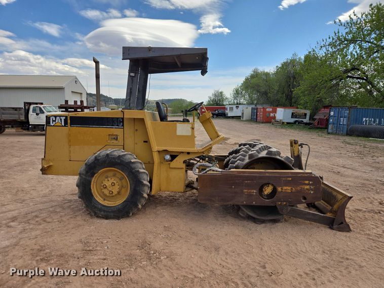 image for item EB1458 1997 Caterpillar CP-433C single drum vibratory roller