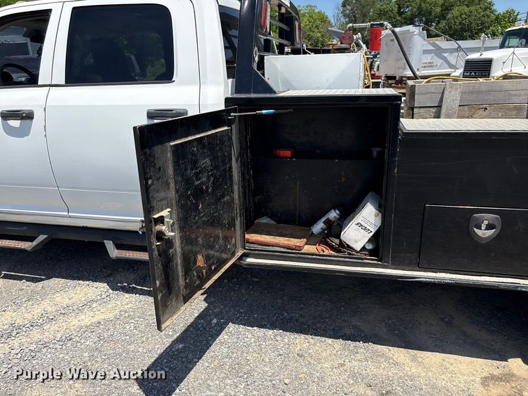 image for item EF1169 2017 RAM 5500 Crew Cab flatbed truck