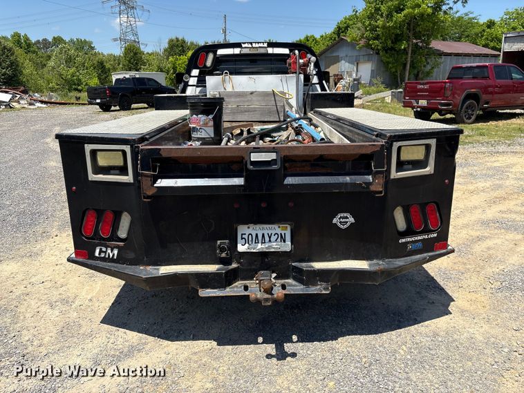 image for item EF1169 2017 RAM 5500 Crew Cab flatbed truck