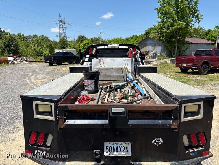image for item EF1169 2017 RAM 5500 Crew Cab flatbed truck
