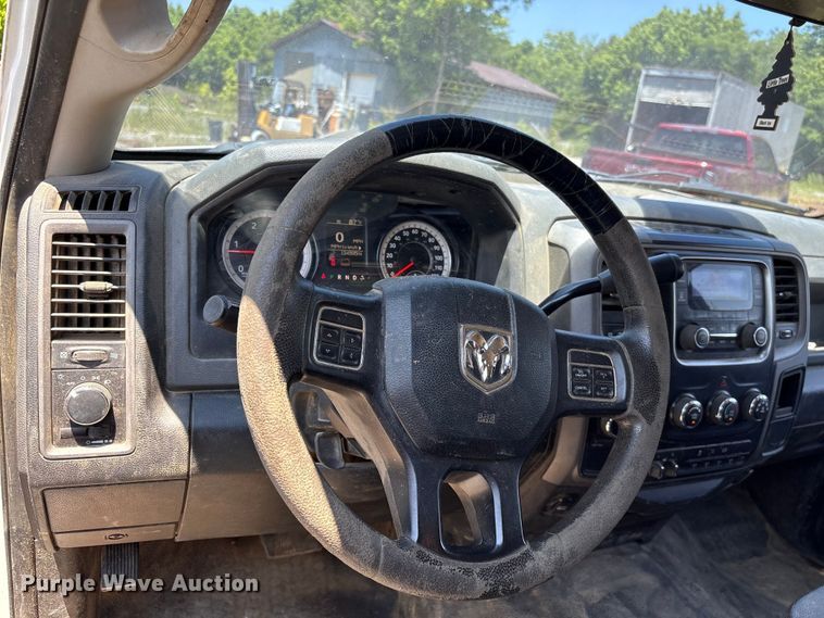 image for item EF1169 2017 RAM 5500 Crew Cab flatbed truck