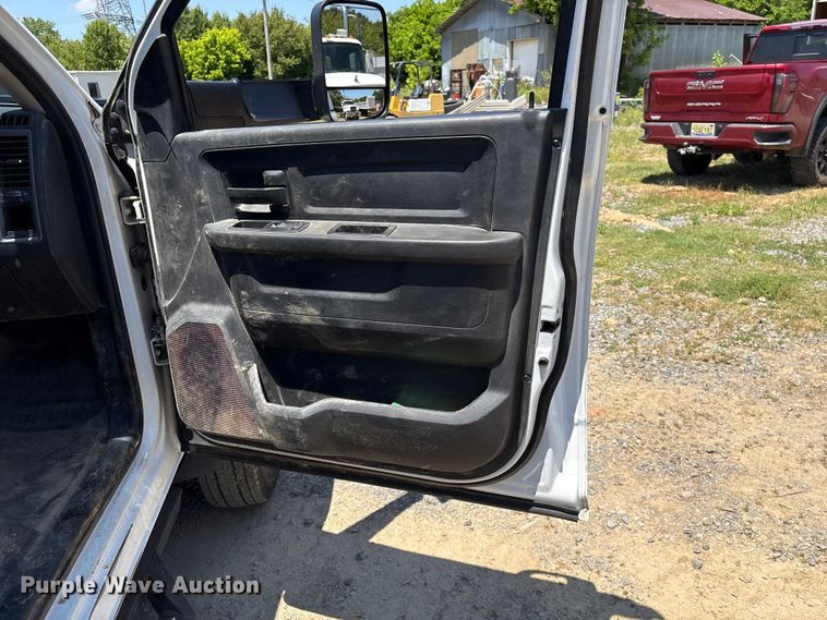 image for item EF1169 2017 RAM 5500 Crew Cab flatbed truck