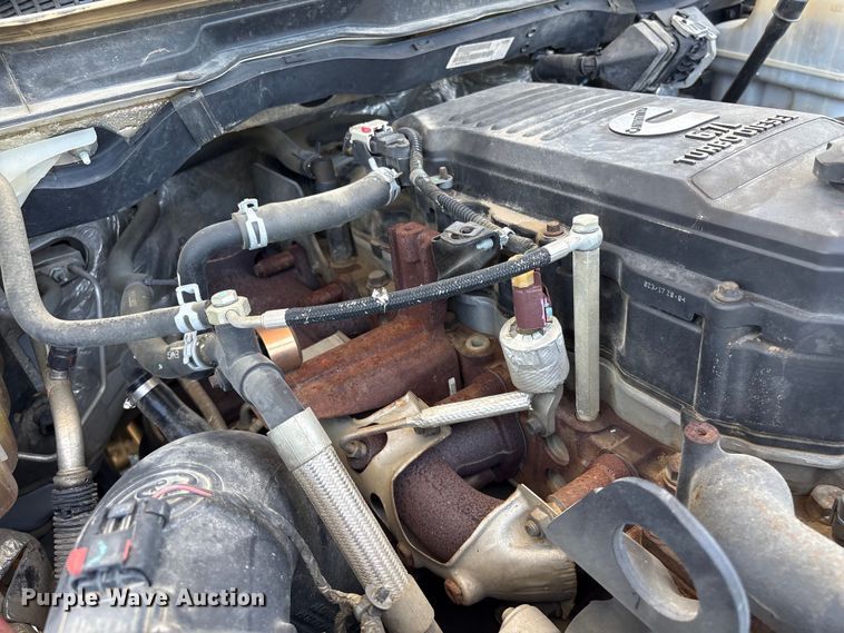 image for item EF1169 2017 RAM 5500 Crew Cab flatbed truck