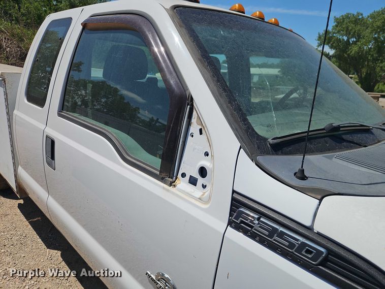 image for item EO7310 2011 Ford F350 Super Duty Ext. Cab utility bed pickup truck
